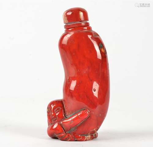 A 19th Century Chinese red coral erotic scent bottle, height including stopper 10cm