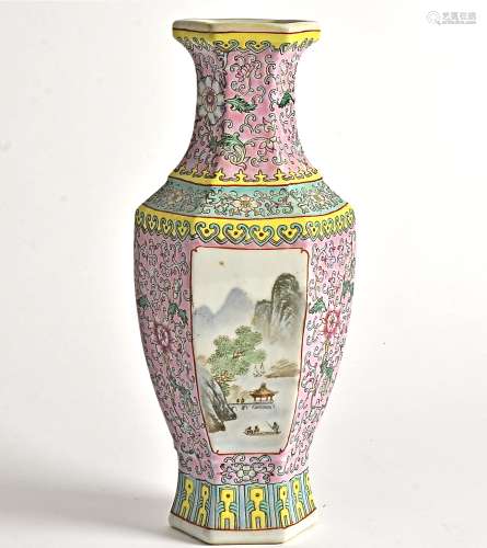 A 20th Century Chinese fencai enamelled hexagonal vase, with upper ruyi border and landscape panels,