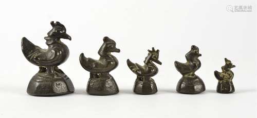A set of Chinese bronze opium weights, taking the form of cockerels, height of largest 6.5cm (5)