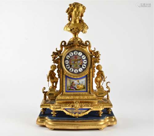 A French spelter and gilt clock, together with a dome, the enamel dial with Roman numerals and