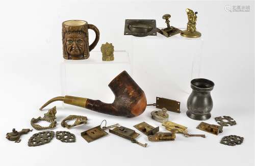 A late 19th Century carved continental pipe by Ropp of Bussang, together with several items of