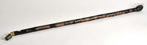 A Chinese lacquered fishing rod, designed with encircling monkeys and snake, length of case 89cm,