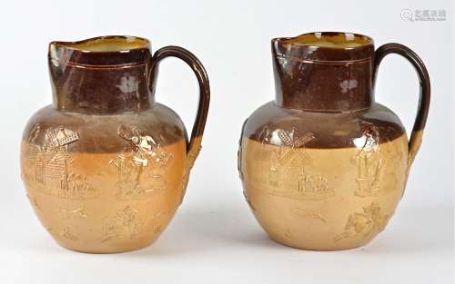 A pair of Doulton Lambeth harvest jugs, height 21cm (2)