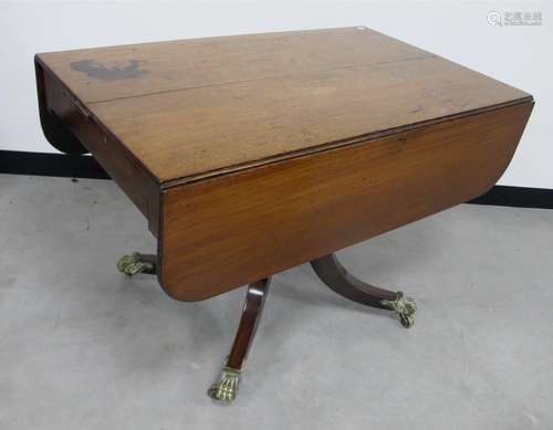 A William IV mahogany breakfast table twin flap top with reeded edge, extendable to take a single