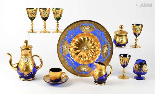 A Bohemian glass service with gilt overlay, including two large bowls, a teapot and cups, multiple