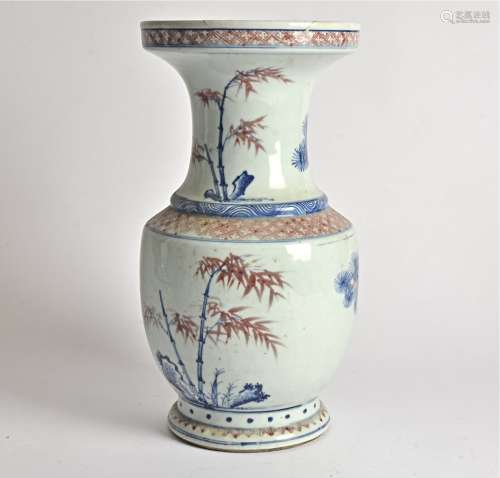 A Chinese porcelain vase, with underglaze copper red and underglaze blue decoration of birds perched