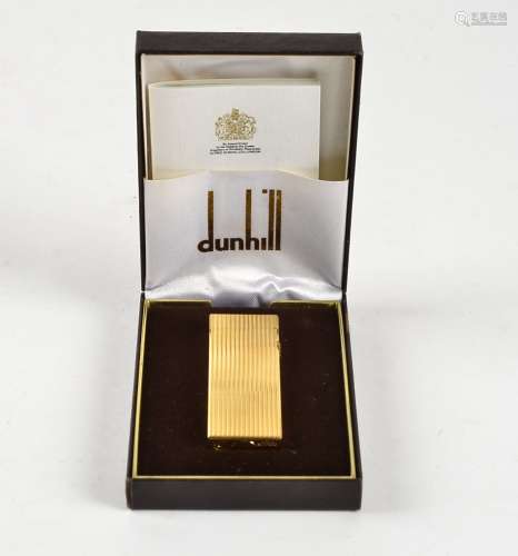 A Dunhill lighter, in original box and sleeve, with engine turned decoration 'Rollagas XB 422'
