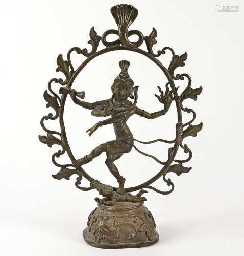 An Indian Shiva Nataraja, the four-armed dancing deity, possibly brass height 24cm