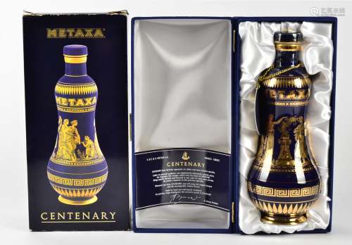 A Dimple Haig Royal Decanter, boxed, together with a Metaxa Brandy Centenary Bottle (2)