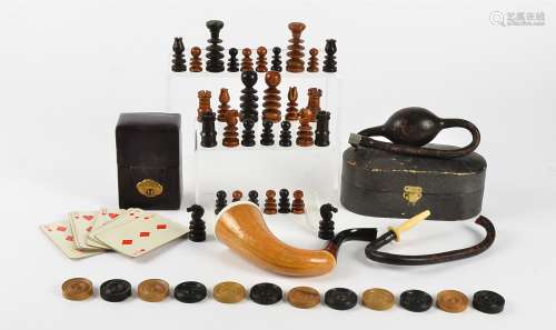 A 20th Century carved wooden chess set, glazed, height of king 6cm (missing one white pawn), (AF),