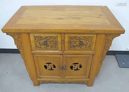 A contemporary Asian/Chinese blonde hardwood sideboard, rectangular top above two frieze drawers and
