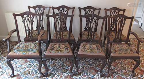 A late 19th Century set of eight stained beech style chairs, comprising two carvers and six sides,