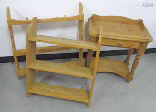 A pine single drawer telephone table, 62cm x 62cm x 34cm, sold together with two pine hanging wall
