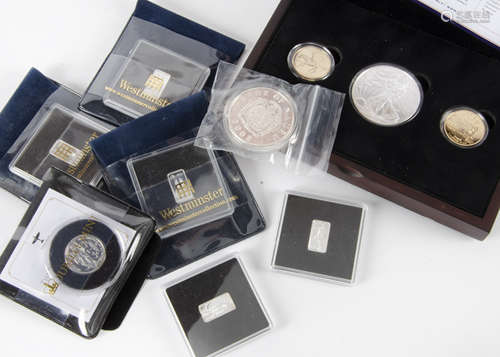 A modern three coin set in case, titled and including The 15th Anniversary of the US State Quarter