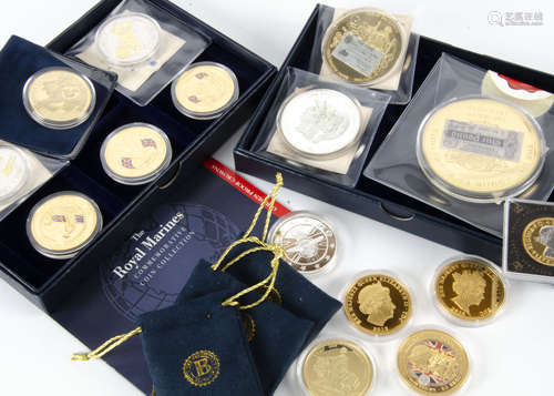 A collection of proof like coins and medallions and stamps, including a seven coin Dunkirk Little