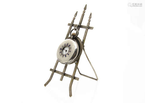 An early 20th century silver half hunter pocket watch, AF, together with a silver plated easel