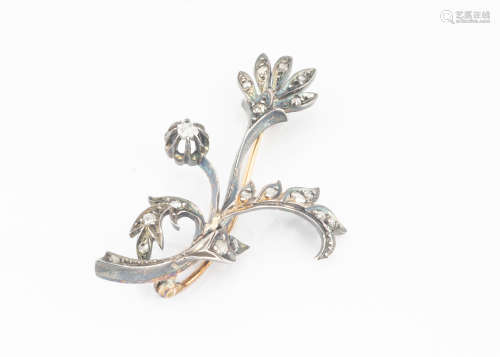 A 19th Century French diamond set floral brooch, of spray design, the rose cut silver set diamonds