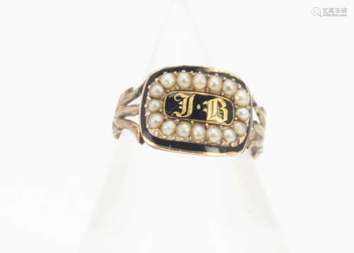 A 19th Century mourning ring, the enamel and seed pearl setting with gothic initials JB, on a