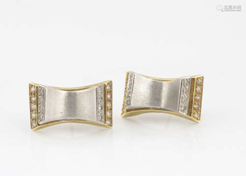 A pair of two coloured gold and diamond ear studs, satin finish with diamond terminals and gold