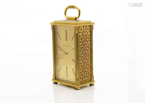 A gilt timepiece by Jaeger Le Coultre, no. 494, rectangular with pierced sides, eight day