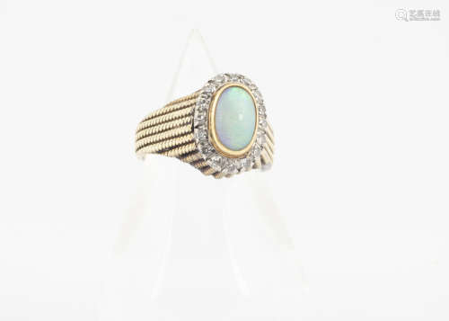 A 14k continental opal and diamond dress ring, the white opal cabochon in gold collet setting