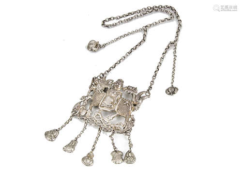 A late 19th century silver plated chatelain, with roman inspired clasp supporting five chains with a