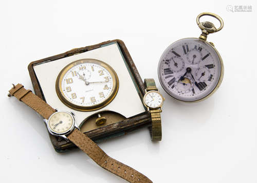 An Edwardian glass globe desk watch, appears to run but needs attention, with calandar subsiduary