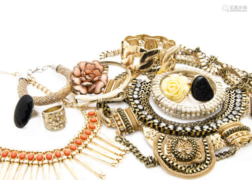 A collection of costume jewellery, including various bangles, ornate gilt necklaces and other items