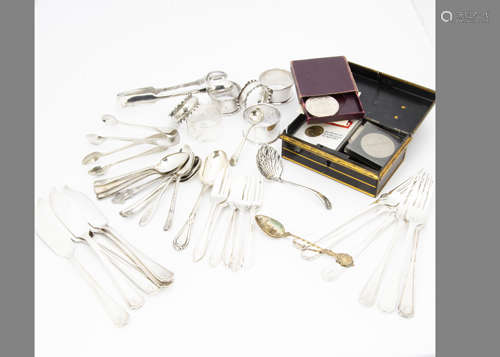 A group of silver and silver plated, including silver teaspoons, plated flatware, napkin rings,