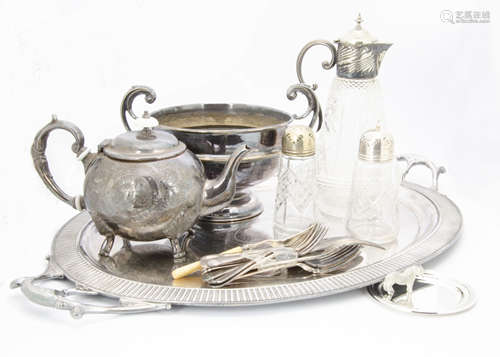 A collection of silver plate, including a large Edwardian oval twin handled tray, a cut glass claret