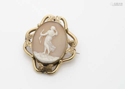 A 19th Century cameo brooch, the oval shell depicting Diana the huntress with bow, within a gilt