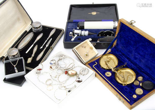 A part cased George V silver manicure set, lacks scissors, together with a 9ct gold wedding band,