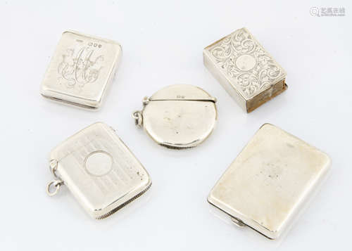 Three silver vestas and a matchbox holder, including one circular, and two rectangular vesta