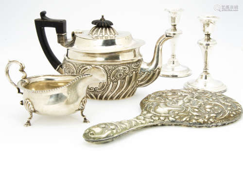 A Victorian silver teapot by TH, together with a George V silver sauce boat from Mappin & Webb, 20.6