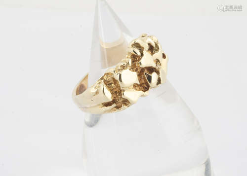 A 9ct gold textured dress ring, ring size S, 10g