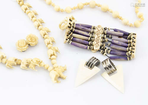 A collection of various bone jewellery, including necklaces, earrings and other items