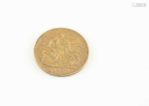 A Victorian gold half sovereign, dated 1899, VF, some denting