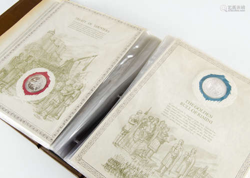 A 1980s set of The World's Great Historic Seals, produced by Franklin Mint, in folder and containing