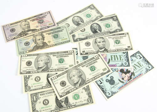 Twn United States of America bank notes, including two $1 with consecutive numbers, two $10 with