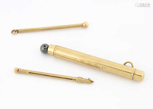 A Victorian 9ct gold drop pencil by Samson Morden & Co, hallmarked for 1871, with engraved initials,