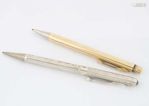 A 1970s silver retractable pencil, together with a gold plated Eversharp retractable pencil (2)