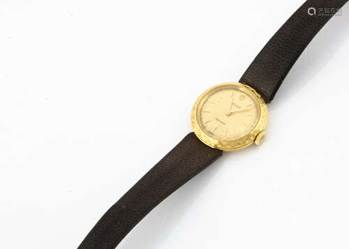 A c1980s Rolex gold cased lady's wristwatch, 21mm, gold coloured dial with batons, with textured