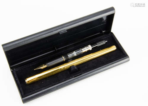 A modern Mont Blanc fountain pen, gold plated, with box and spare inner