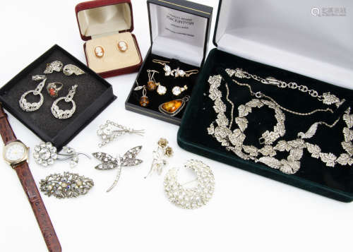 A collection of costume jewellery, including a pair of shell cameo stud earrings, various paste