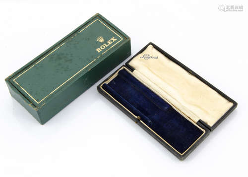 A late 1950s Rolex box, green with gilt decoration, green velvet watch support, possibly for