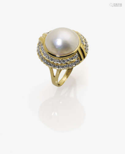 A Mabé Cultured Pearl and Diamond RingA Mabé Cultured Pearl and Diamond Ring<