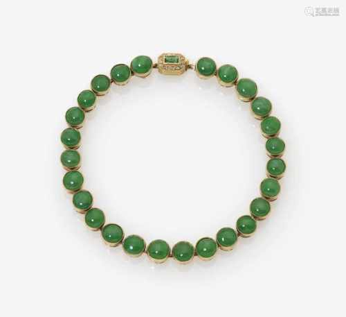 A Jade Bracelet with Emerald and Diamond Clasp