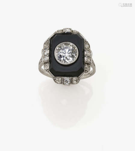 An Onyx and Diamond Ring