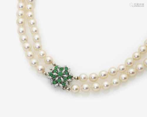 A Two-Strand Cultured Pearl Necklace with Emerald and Diamond Clasp