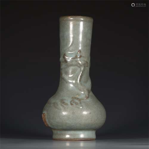 A Chinese Carved Dragon Patterned Porcelain Vase